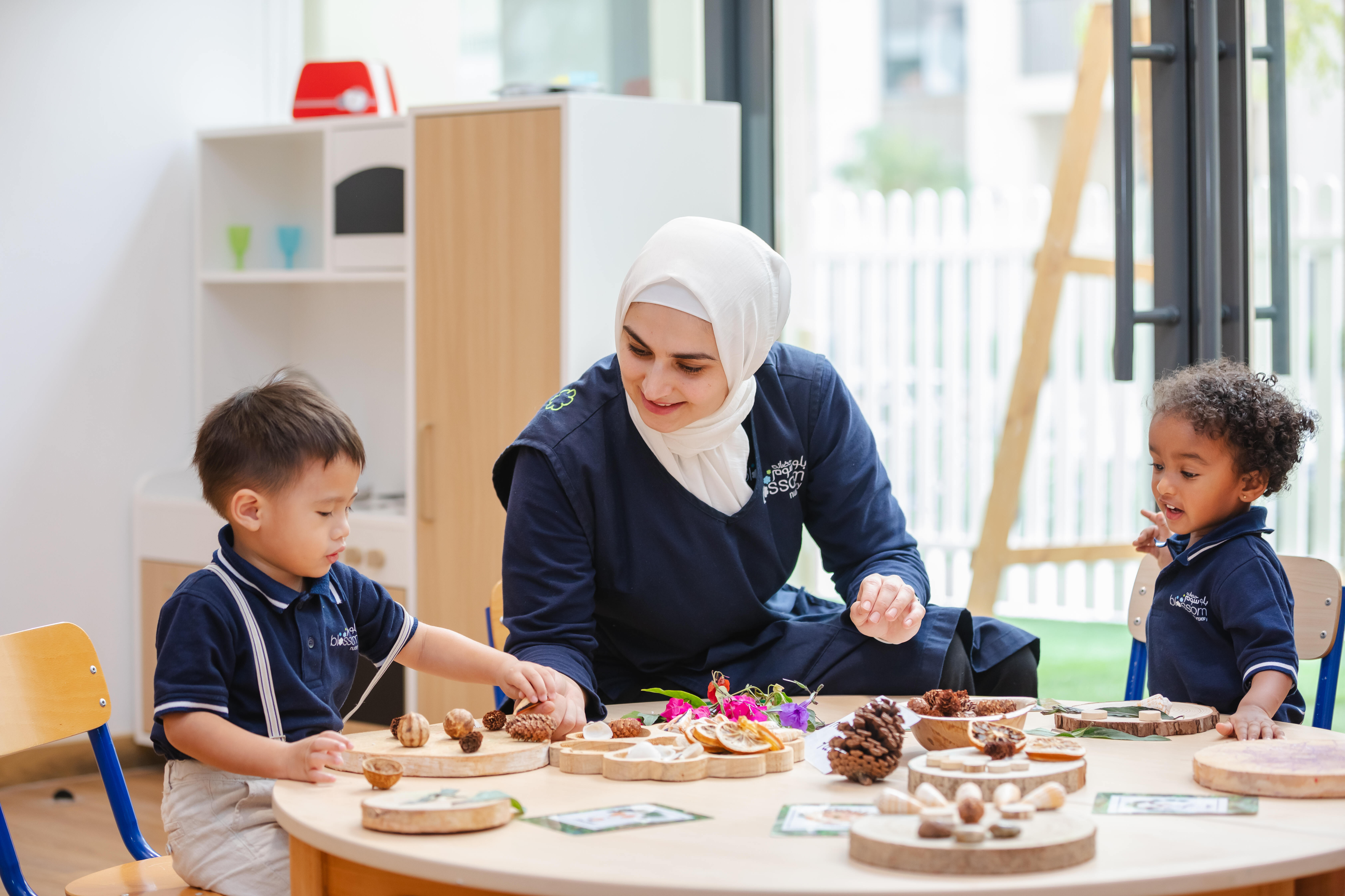 teacher with students sharjah 