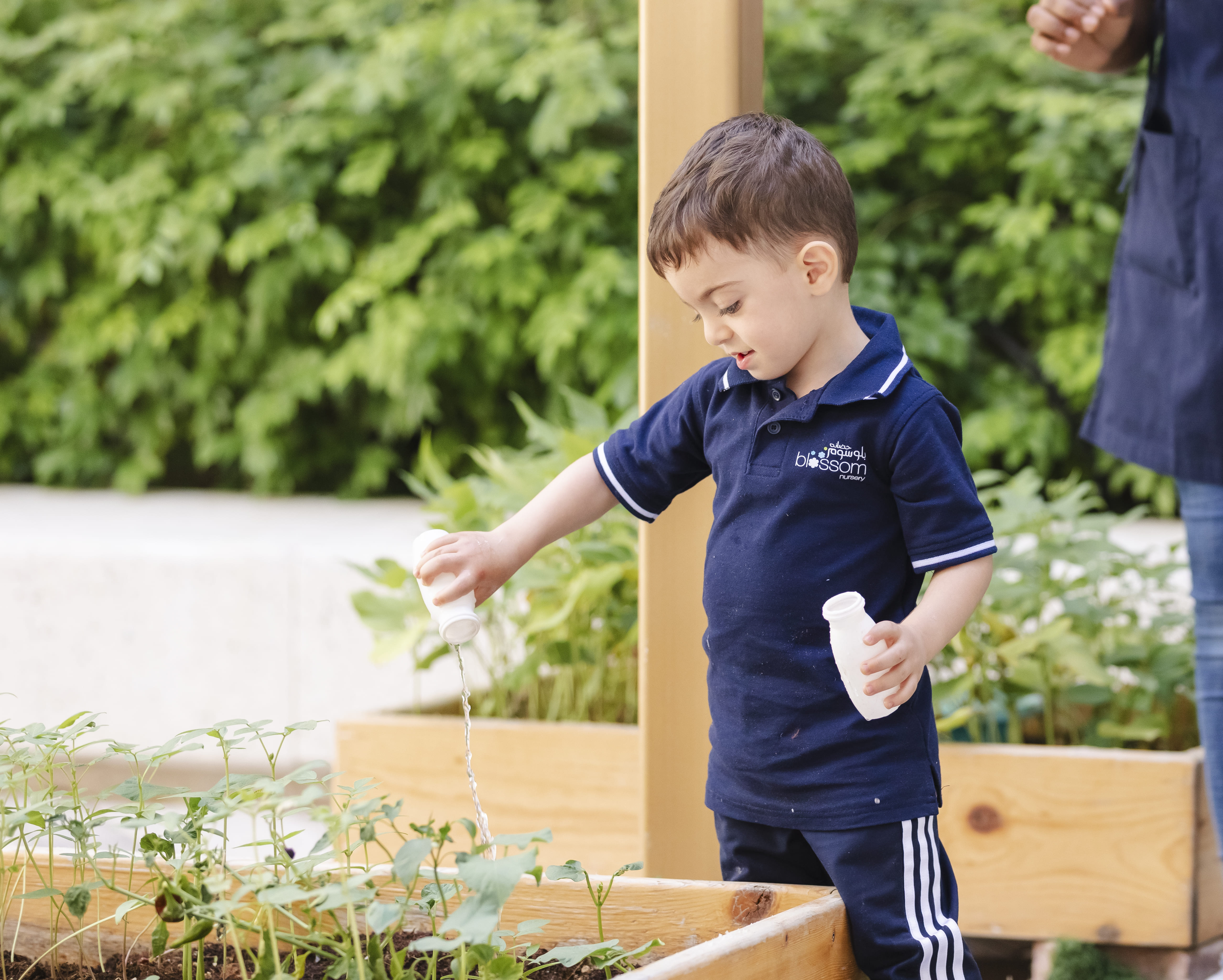 kid playing at park in blossom nursery