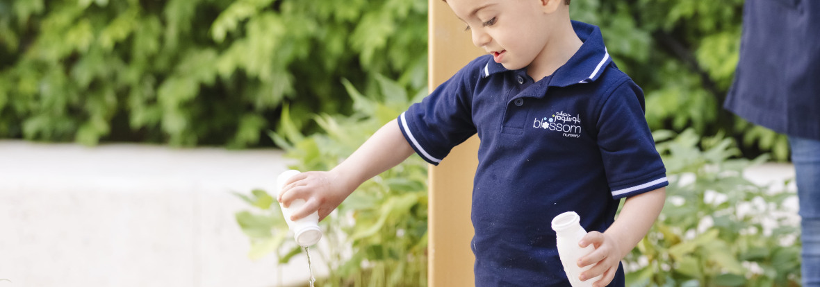 kid playing at park in blossom nursery